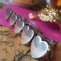 anillo doble corazones